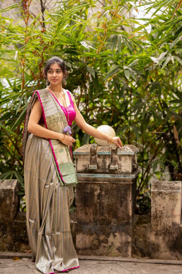 A Banarasi silk with a vertical stripe hand woven design with a zari pallu elevates the look - Image 3