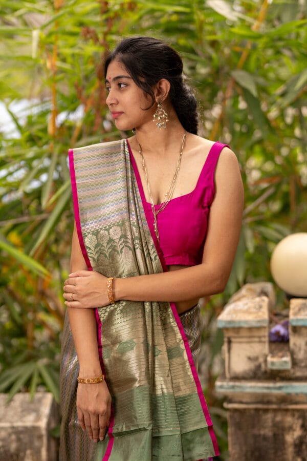 A Banarasi silk with a vertical stripe hand woven design with a zari pallu elevates the look - Image 4