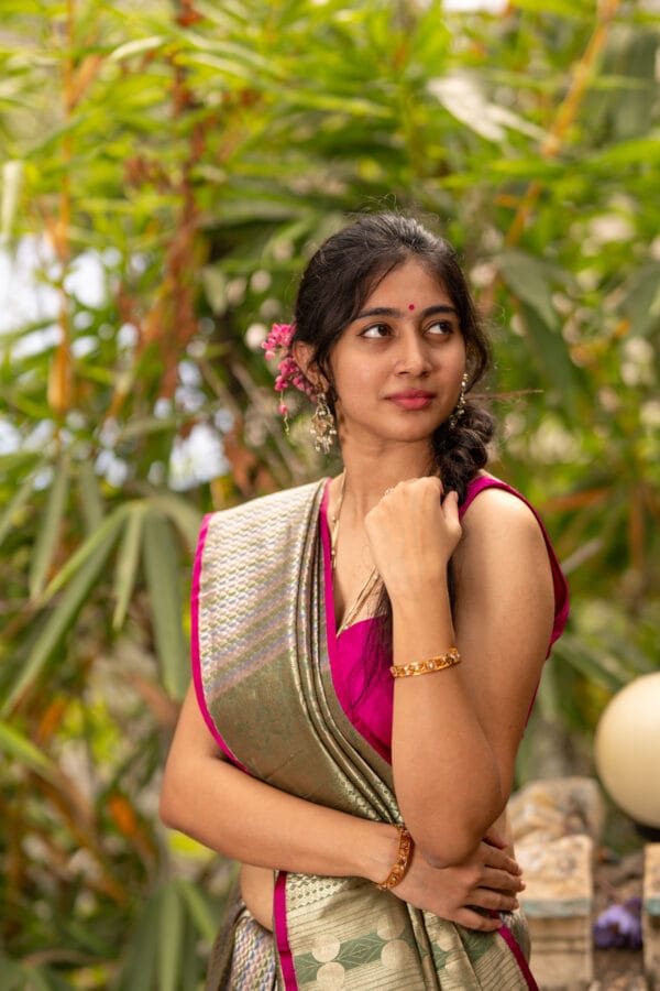 A Banarasi silk with a vertical stripe hand woven design with a zari pallu elevates the look - Image 5