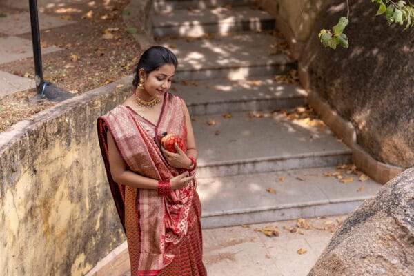 A Banarasi silk with a vertical stripe hand woven design with a zari pallu elevates the look - Image 6