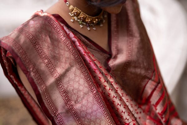 A Banarasi silk with a vertical stripe hand woven design with a zari pallu elevates the look - Image 8