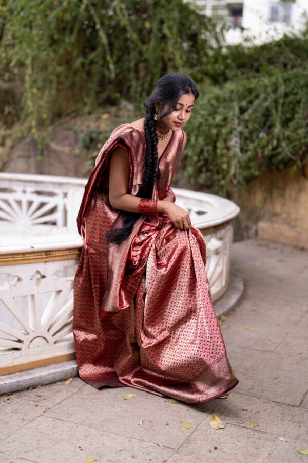 A Banarasi silk with a vertical stripe hand woven design with a zari pallu elevates the look - Image 9
