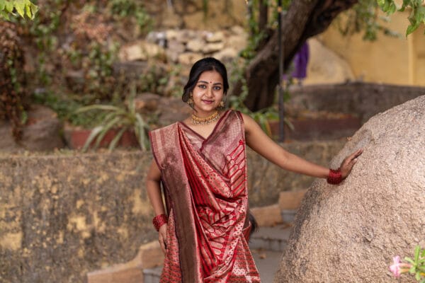 A Banarasi silk with a vertical stripe hand woven design with a zari pallu elevates the look - Image 10