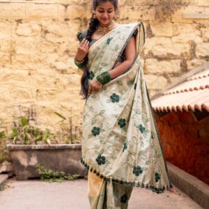 A kanjivaram with neem Zari with a horizontal stripes & zari ascending towards the pallu