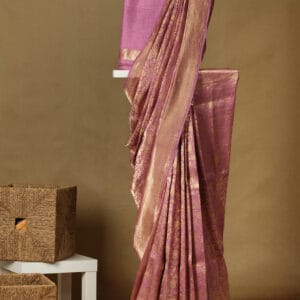 Banarasi saree with all over animal print woven in zari with a zari border & pallu gives exquisite look