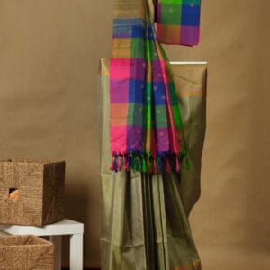 A lightweight mercerised silk saree with a woven paisley thread border