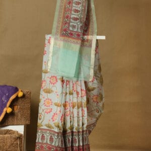 A banarasi organza with a sleek zari border & digital printed pichwai design