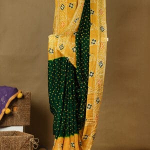 Modal silk with resist dyeing technique of bandini in the body and batik in the border