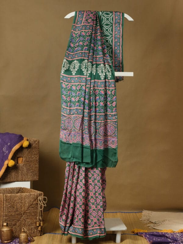 A modal silk with ajrakh prints in a pastel shade impacts a customary touch