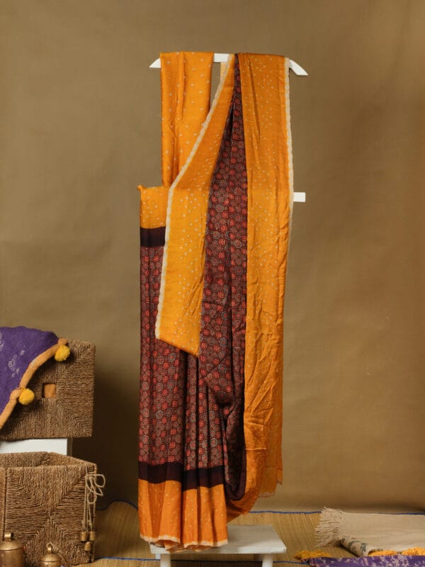 Modal silk with traditional ajrakh blocked in the body of the saree