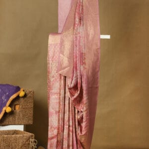 A tissue banarasi saree with floral digital print motifs with a plain tissue blouse.