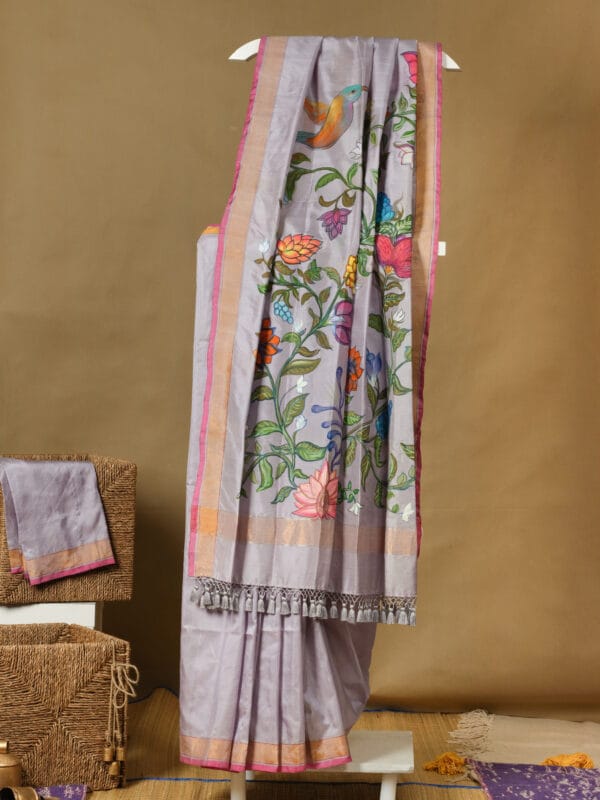 A 4 ply silk saree with floral & painting on the pallu.